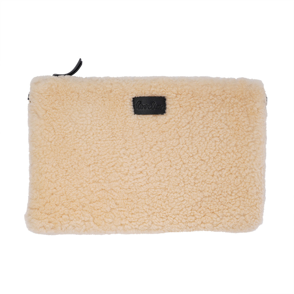 Lovelies Studio Wujii is a large shearling clutch which has room enough for your Ipad and notebooks . Wujii is hand made from the finest curly shearling from Australia.  Top zipped closing   Detachable wrist strap   Satin lining and flat zipped inner pocket   Item comes with a branded dust bag.   Embossed Lovelies logo on the front   Gold-toned hardware   Measurements W34 X D2 X H22 cm   100 % Australian curly shearling