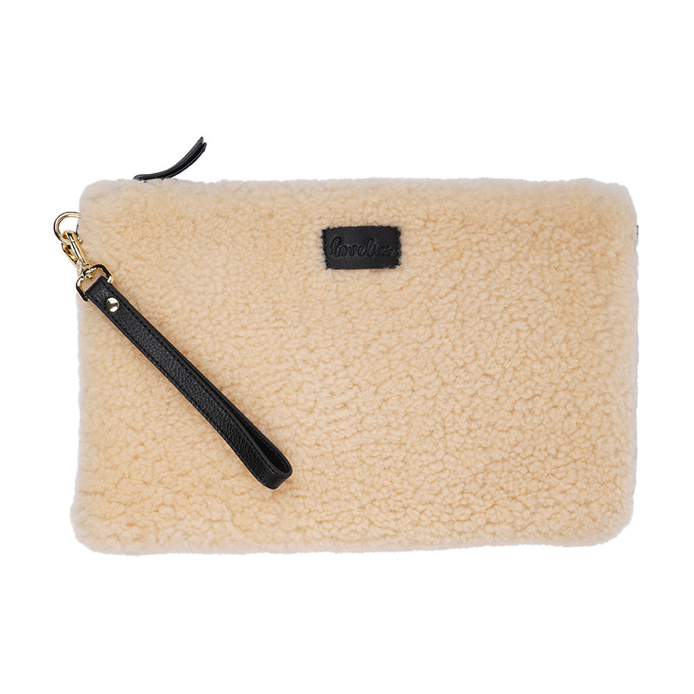 Lovelies Studio Wujii is a large shearling clutch which has room enough for your Ipad and notebooks . Wujii is hand made from the finest curly shearling from Australia.  Top zipped closing   Detachable wrist strap   Satin lining and flat zipped inner pocket   Item comes with a branded dust bag.   Embossed Lovelies logo on the front   Gold-toned hardware   Measurements W34 X D2 X H22 cm   100 % Australian curly shearling