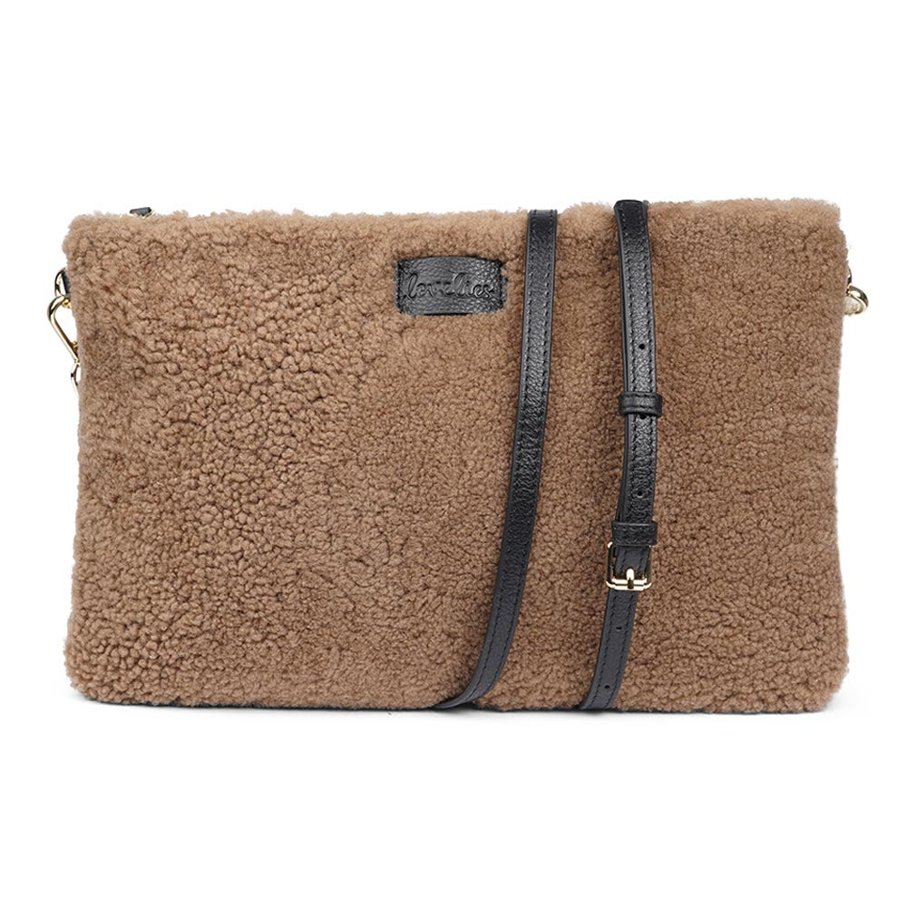 Lovelies Studio Wujii is a large shearling clutch which has room enough for your Ipad and notebooks . Wujii is hand made from the finest curly shearling from Australia. Top zipped closing Detachable wrist strap Satin lining and flat zipped inner pocket Item comes with a branded dust bag. Embossed Lovelies logo on the front Gold-toned hardware Measurements W34 X D2 X H22 cm 100 % Australian curly shearling