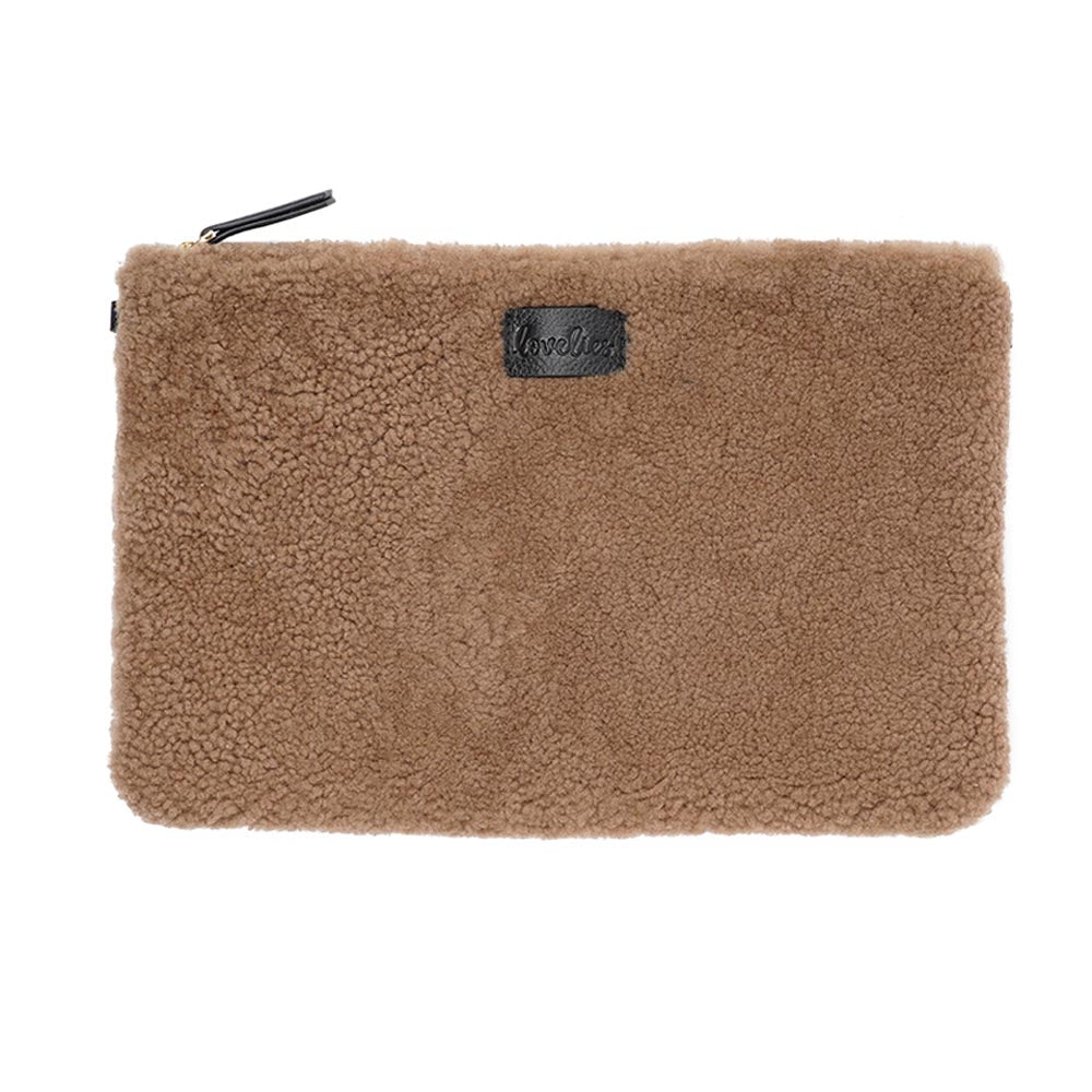 Lovelies Studio Wujii is a large shearling clutch which has room enough for your Ipad and notebooks . Wujii is hand made from the finest curly shearling from Australia. Top zipped closing Detachable wrist strap Satin lining and flat zipped inner pocket Item comes with a branded dust bag. Embossed Lovelies logo on the front Gold-toned hardware Measurements W34 X D2 X H22 cm 100 % Australian curly shearling
