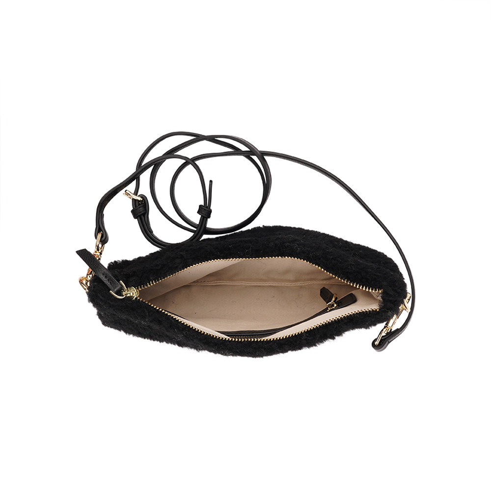 Lovelies Studio _ Wuttu is a mini clutch with a detachable wrist strap and is perfect for carrying your essentials with you. Wuttu is hand made from the finest curly shearling from Australia. Top zipped closing Detachable wrist strap Satin lining and flat zipped inner pocket Item comes with a branded dust bag. Embossed Lovelies logo on the front Gold-toned hardware Measurements W26 X D2 X H12 cm 100 % Australian curly shearling