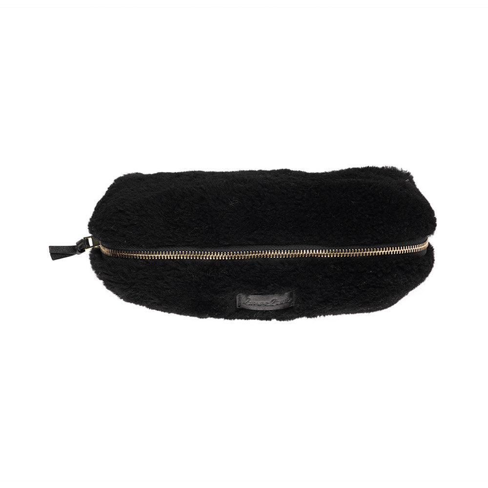 Lovelies Studio - Yadong is a beautiful shearling handbag which is perfect for carrying your essentials with you. Use Yadong as a casual clutch or an exclusive beauty bag for travelling.    Top zipped closure.  Cream satin lining.    Item comes with a branded dust bag.   Embossed Lovelies logo on the front.    Gold-toned hardware. Measurements W25 X D10 X H13 cm  100 % Australian curly shearling.