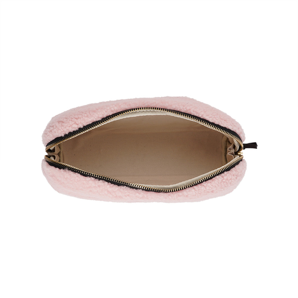 Lovelies Studio - Yadong is a beautiful shearling handbag which is perfect for carrying your essentials with you. Use Yadong as a casual clutch or an exclusive beauty bag for travelling. Top zipped closure. Cream satin lining. Item comes with a branded dust bag. Embossed Lovelies logo on the front. Gold-toned hardware. Measurements W25 X D10 X H13 cm 100 % Australian curly shearling.