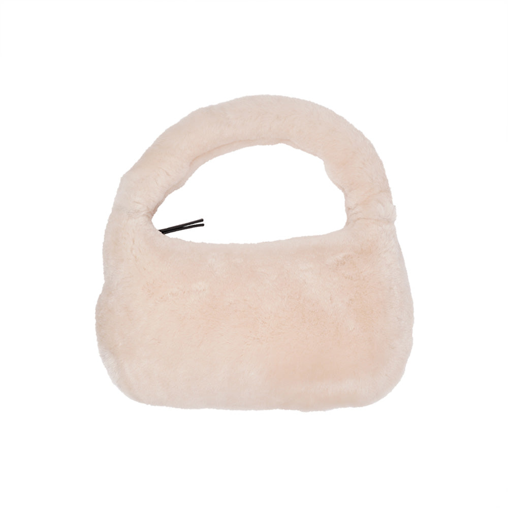 Lovelies Studio - Zhamo is a beautiful small shearling handbag which is perfect for carrying your essentials with you.  * Top handle in thick shearling   * Adjustable and detachable shoulder strap in leather   * Satin lining and flat zipped inner pocket   * Item comes with a branded dust bag.   * Gold-toned hardware   * Messurements W26 X D6 X H24 cm   * 100 % Australian shearling