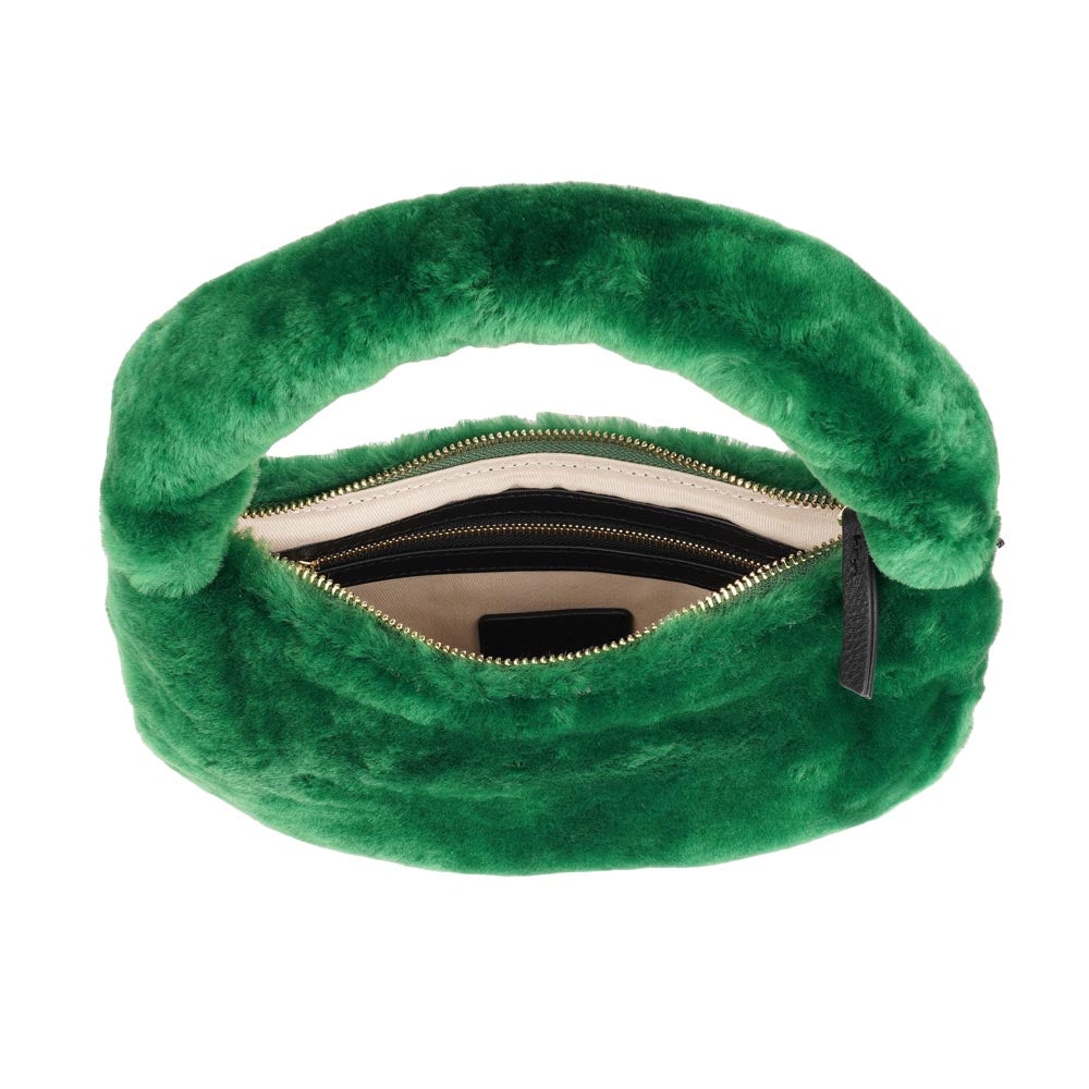 Lovelies Studio - Zhamo is a beautiful small shearling handbag which is perfect for carrying your essentials with you. * Top handle in thick shearling * Adjustable and detachable shoulder strap in leather * Satin lining and flat zipped inner pocket * Item comes with a branded dust bag. * Gold-toned hardware * Messurements W26 X D6 X H24 cm * 100 % Australian shearling