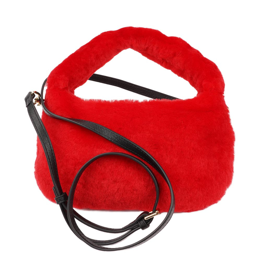 Lovelies Studio - Zhamo is a beautiful small shearling handbag which is perfect for carrying your essentials with you. * Top handle in thick shearling * Adjustable and detachable shoulder strap in leather * Satin lining and flat zipped inner pocket * Item comes with a branded dust bag. * Gold-toned hardware * Messurements W26 X D6 X H24 cm * 100 % Australian shearling