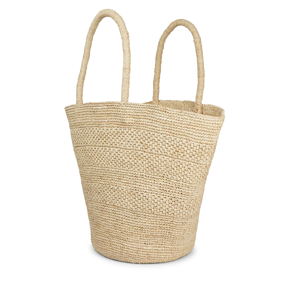 Anakao, the charming bag fashioned from luxurious raffia sourced from Madagascar.

Tailored for your everyday adventures, this tote boasts a spacious main compartment to accommodate all your necessities while you're on the move.

Raffia, derived from the resilient leaves of the palm tree, is celebrated for its versatility and eco-conscious qualities, making it a sought-after material in the realm of fashion accessories.

Handcrafted with precision, raffia handbags epitomize a blend of casual sophistication,