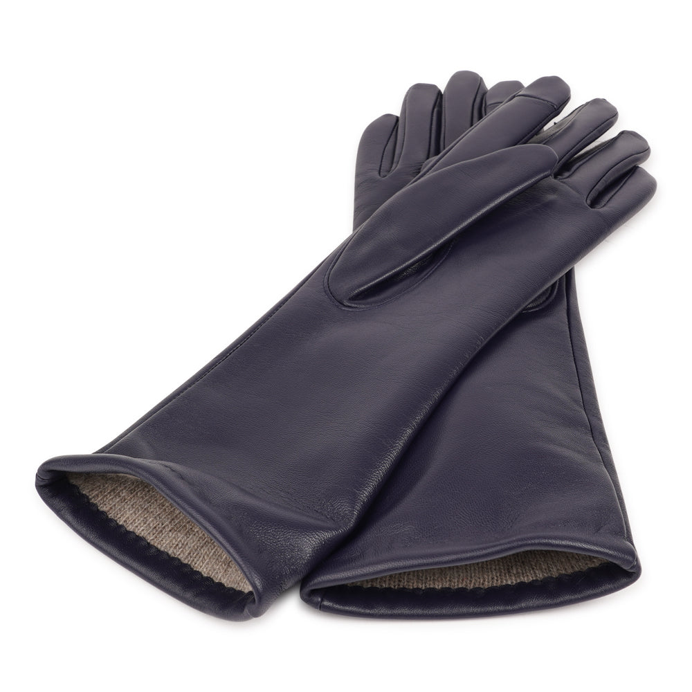Lovelies Studio - The Bargia gloves are crafted from soft, supple leather and lined with luxurious cashmere for exceptional warmth and comfort. Designed with a feminine silhouette, they combine elegance and practicality in one timeless piece. Perfect for elevating your winter wardrobe, these gloves bring a refined finishing touch to any cold-weather outfit.