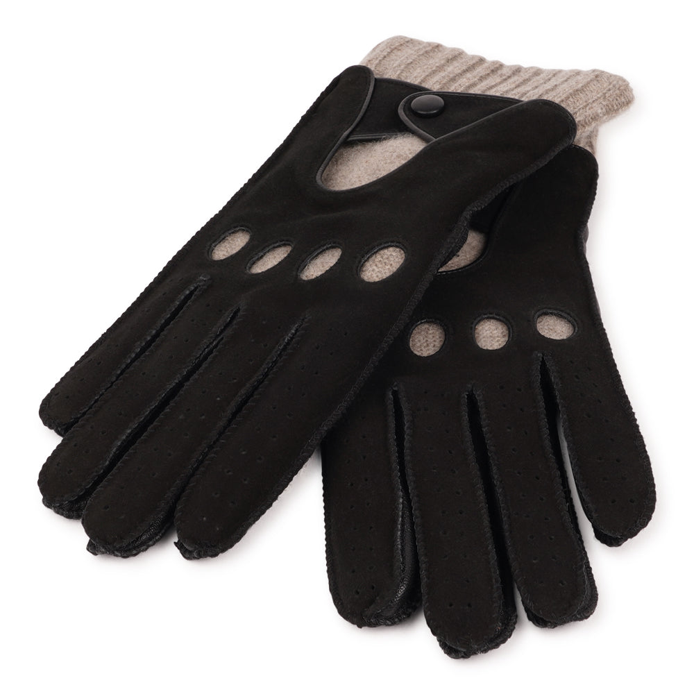 Stay warm, drive in style . .

The Batia gloves combine timeless style with everyday luxury, crafted from soft lambskin and suede. Lined with warm wool, they offer both comfort and function, while the refined design makes them the perfect accessory to elevate your winter look. With their effortless coolness, these driving gloves add a modern edge to any outfit.