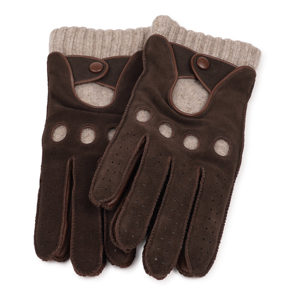 Stay warm, drive in style . .

The Batia gloves combine timeless style with everyday luxury, crafted from soft lambskin and suede. Lined with warm wool, they offer both comfort and function, while the refined design makes them the perfect accessory to elevate your winter look. With their effortless coolness, these driving gloves add a modern edge to any outfit.