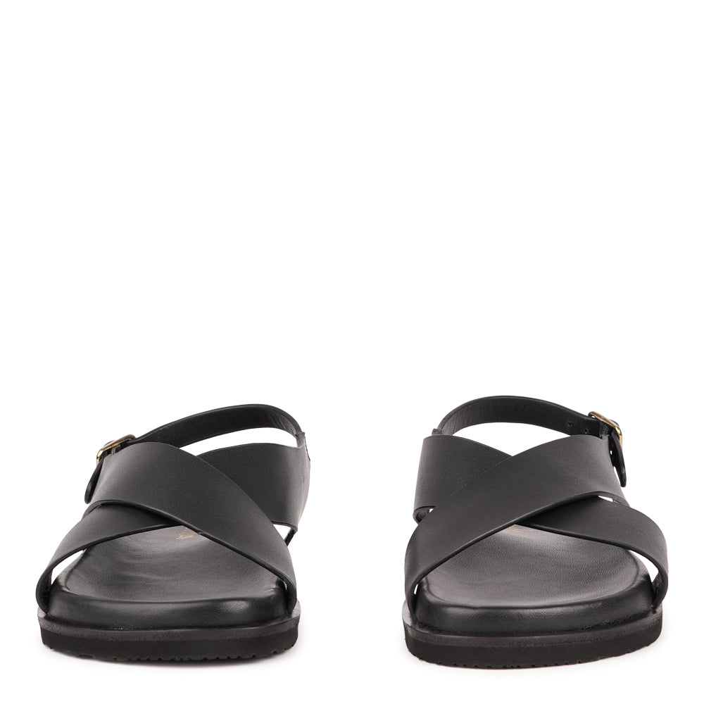 Bologna — a beautifully handcrafted leather sandal designed to balance feminine elegance with everyday comfort. A single adjustable buckle ensures a secure, personalized fit that moves with you throughout the day.

Made from vegetable-tanned buffalo leather, the soft yet durable straps are built to age beautifully over time. Finished with a discreet rubber grip, Bologna offers both stability and ease - perfect for effortless daytime wear and refined evening looks.