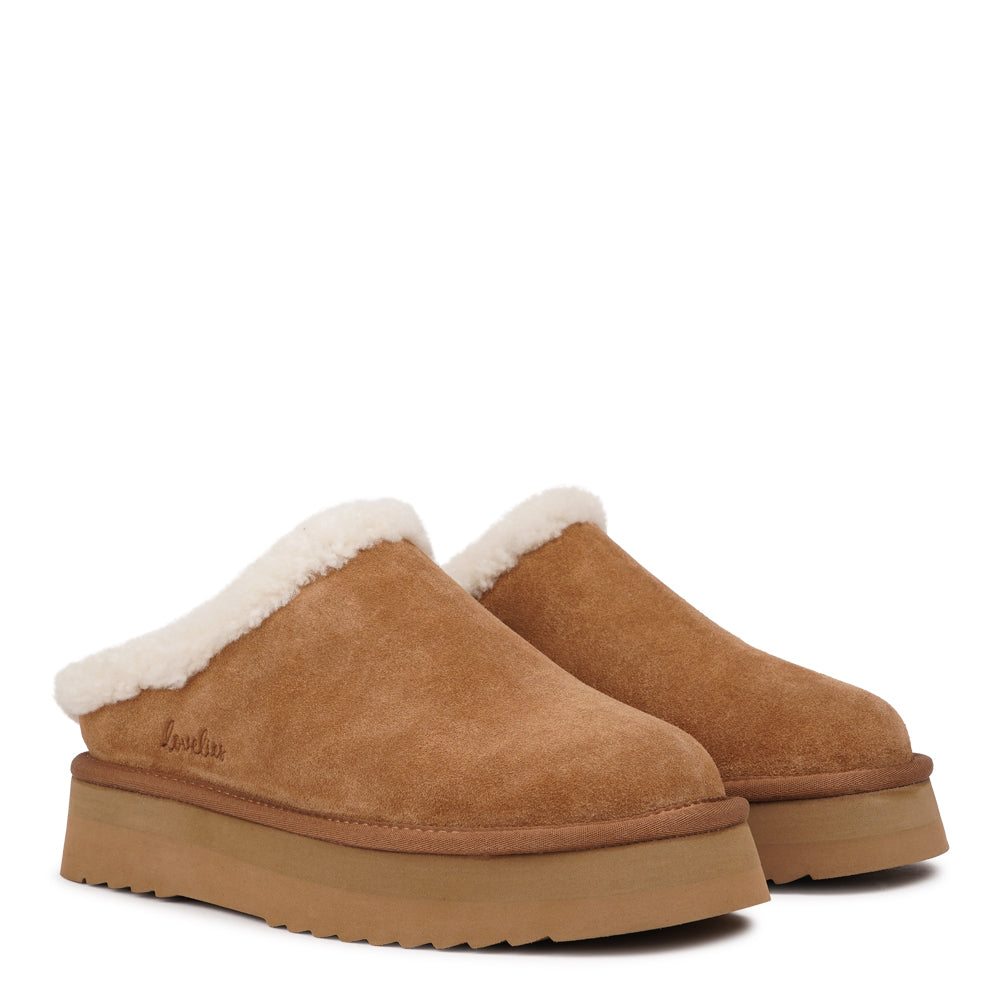 Lovelies Studio - High Mules with Curly Shearling Details
Step into warmth and effortless style with Lovelies’ shearling mules — beautifully crafted to offer ultimate comfort and a timeless look. Made from soft, curly natural shearling and finished with durable, flexible soles, these mules keep your feet cosy and supported all year round.
When you first slip them on, they may feel slightly snug across the toes and instep. Don’t worry — the natural shearling will quickly soften and adapt to your feet