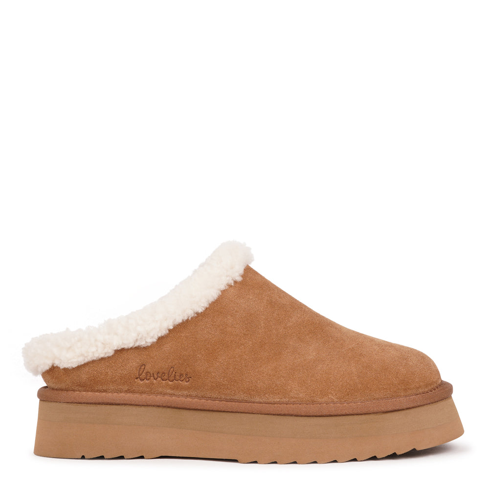 Lovelies Studio - High Mules with Curly Shearling Details
Step into warmth and effortless style with Lovelies’ shearling mules — beautifully crafted to offer ultimate comfort and a timeless look. Made from soft, curly natural shearling and finished with durable, flexible soles, these mules keep your feet cosy and supported all year round.
When you first slip them on, they may feel slightly snug across the toes and instep. Don’t worry — the natural shearling will quickly soften and adapt to your feet