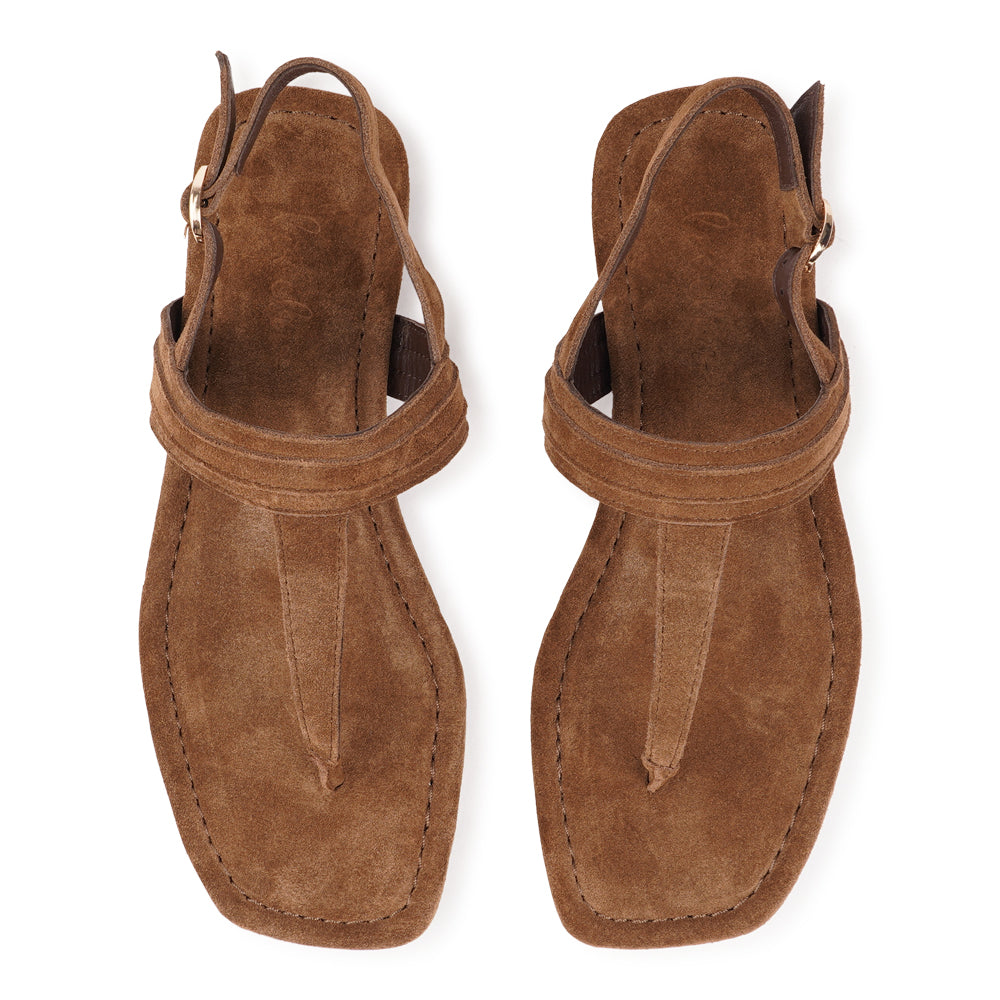 Carini, our luxurious soft suede leather sandals, designed with your comfort and style in mind.

The soft midsole, also covered in supple suede, offers an extra layer of cushioning for unparalleled comfort throughout the day.

With its delicate and soft suede, these sandals effortlessly combine ease and elegance. Whether you're dressing up in a feminine dress or going for a casual summer jeans look, these easy-to-go sandals will complement your outfit flawlessly.