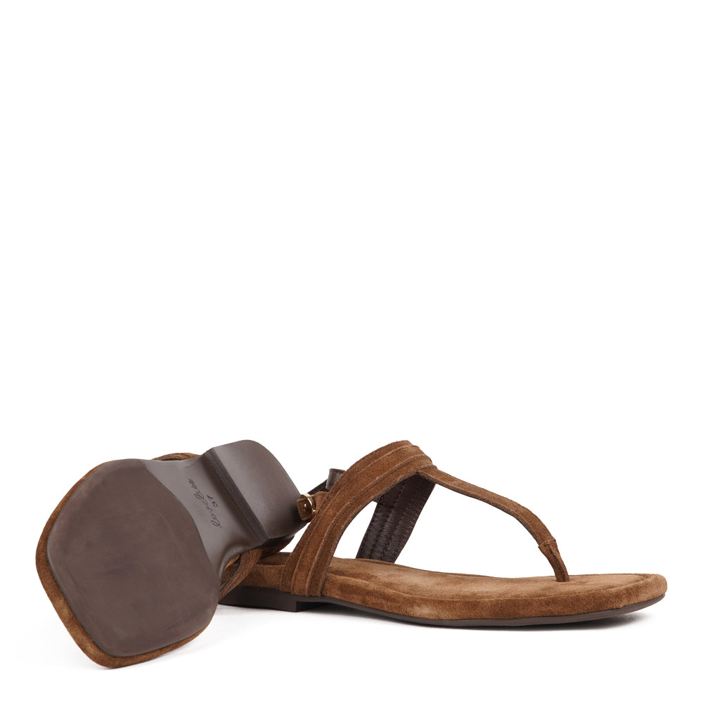 Carini, our luxurious soft suede leather sandals, designed with your comfort and style in mind.

The soft midsole, also covered in supple suede, offers an extra layer of cushioning for unparalleled comfort throughout the day.

With its delicate and soft suede, these sandals effortlessly combine ease and elegance. Whether you're dressing up in a feminine dress or going for a casual summer jeans look, these easy-to-go sandals will complement your outfit flawlessly.