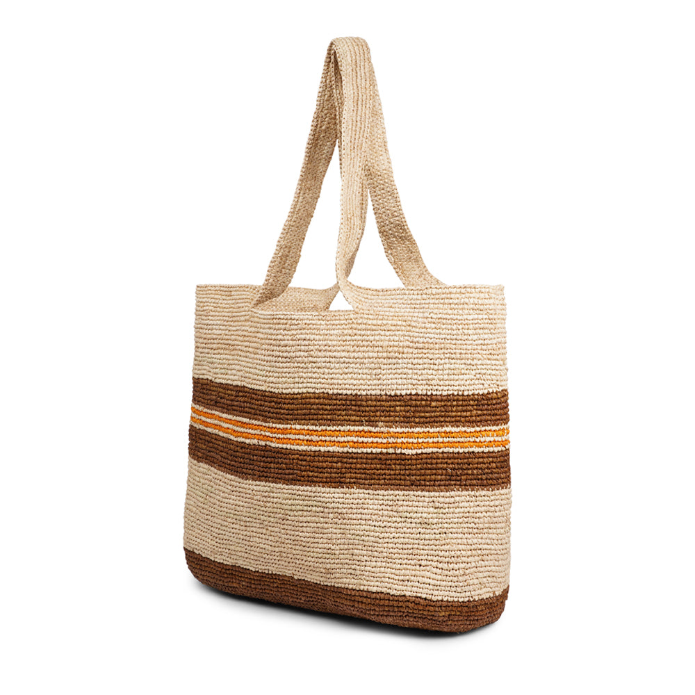 Cavallo, the charming Casual Shoulder tote bag fashioned from luxurious raffia sourced from Madagascar.  Tailored for your everyday adventures, this tote boasts a spacious main compartment to accommodate all your necessities while you're on the move.  Raffia, derived from the resilient leaves of the palm tree, is celebrated for its versatility and eco-conscious qualities, making it a sought-after material in the realm of fashion accessories.