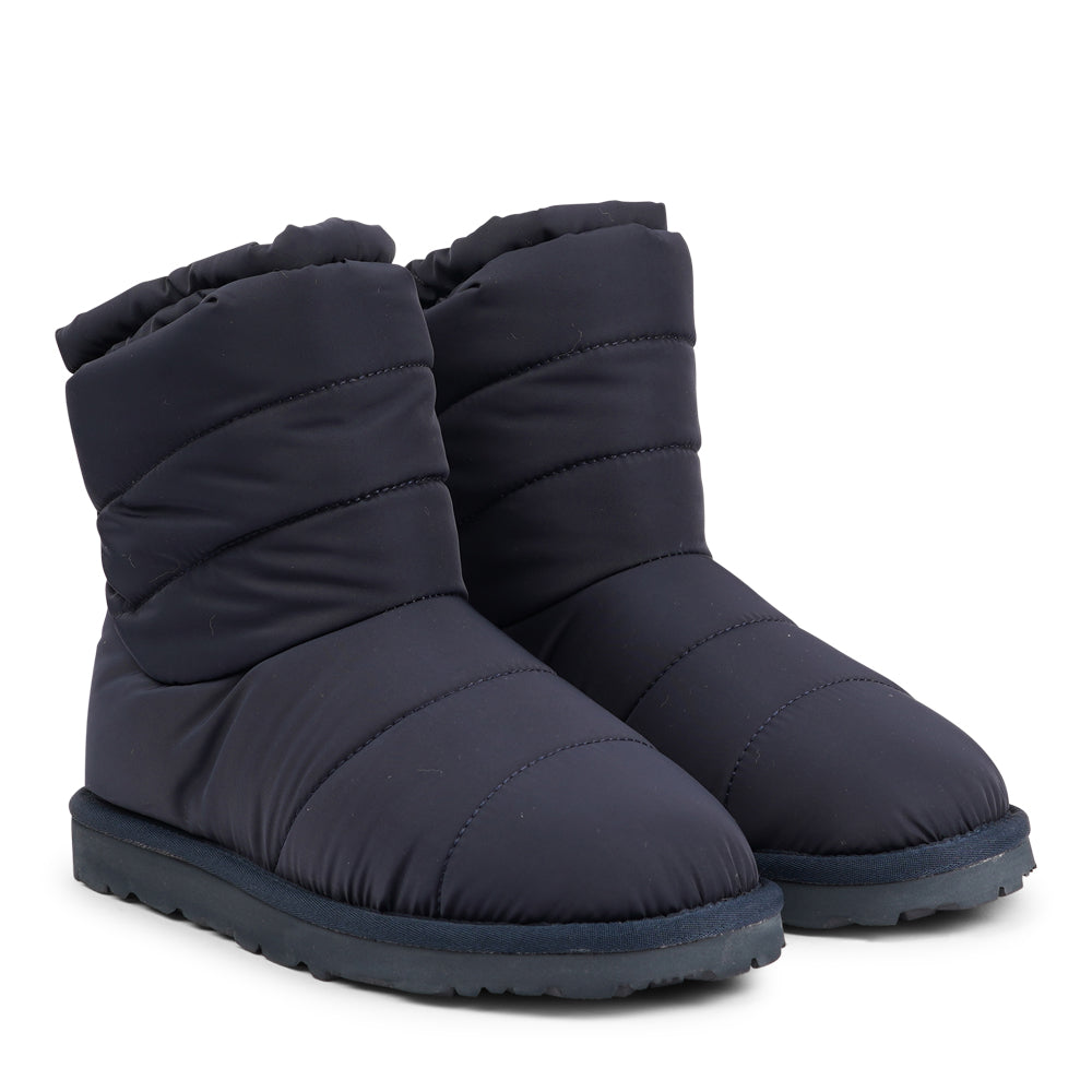 Designed to keep your feet cozy and stylish all autumn long. Experience ultimate softness and warmth as the luxurious shearling lining wraps your feet in comfort.

With their soft and durable rubber soles, these boots provide a perfect combination of flexibility and durability, making them ideal for the wintertime. No need to worry about wet weather – the quilted nylon material is water-resistant, keeping your feet dry and comfortable even on rainy days.