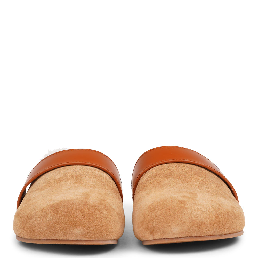 Lovelies Studio - Denmark - Suede mules with curly shearling lining. Lovelies shearling mules will bring softness and warmth to your feet. The combination of soft curly shearling and the durable cork and rubber sole <meta charset="utf-8"><span data-mce-fragment="1">guarantees the utmost comfort to the wearer.