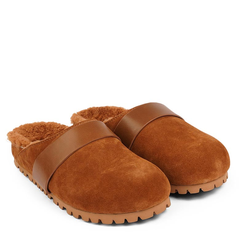 Lovelies Studio - Denmark - Suede mules with curly shearling lining

Lovelies shearling mules will bring softness and warmth to your feet this autumn. The ombination of soft curly shearling and the durable cork and rubber sole guarantees the utmost comfort to the wearer.