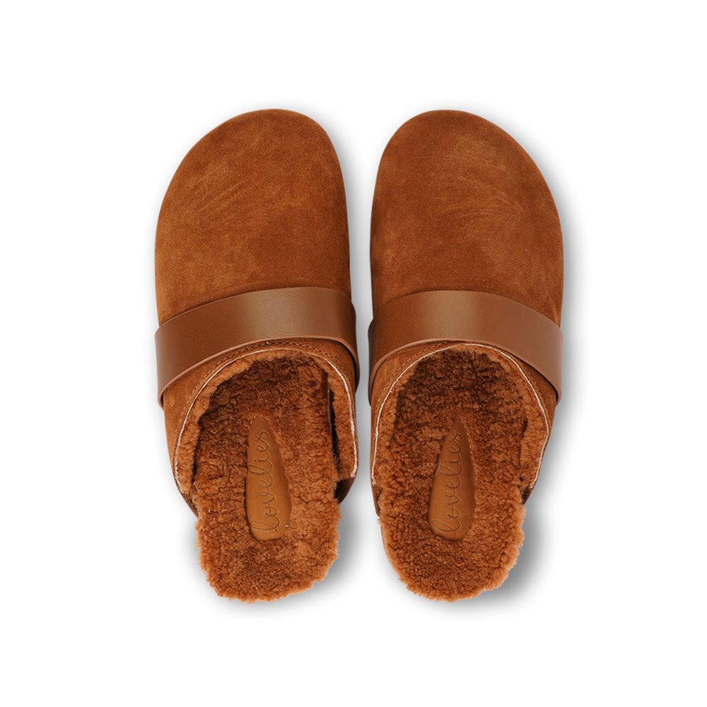Lovelies Studio - Denmark - Suede mules with curly shearling lining

Lovelies shearling mules will bring softness and warmth to your feet this autumn. The ombination of soft curly shearling and the durable cork and rubber sole guarantees the utmost comfort to the wearer.