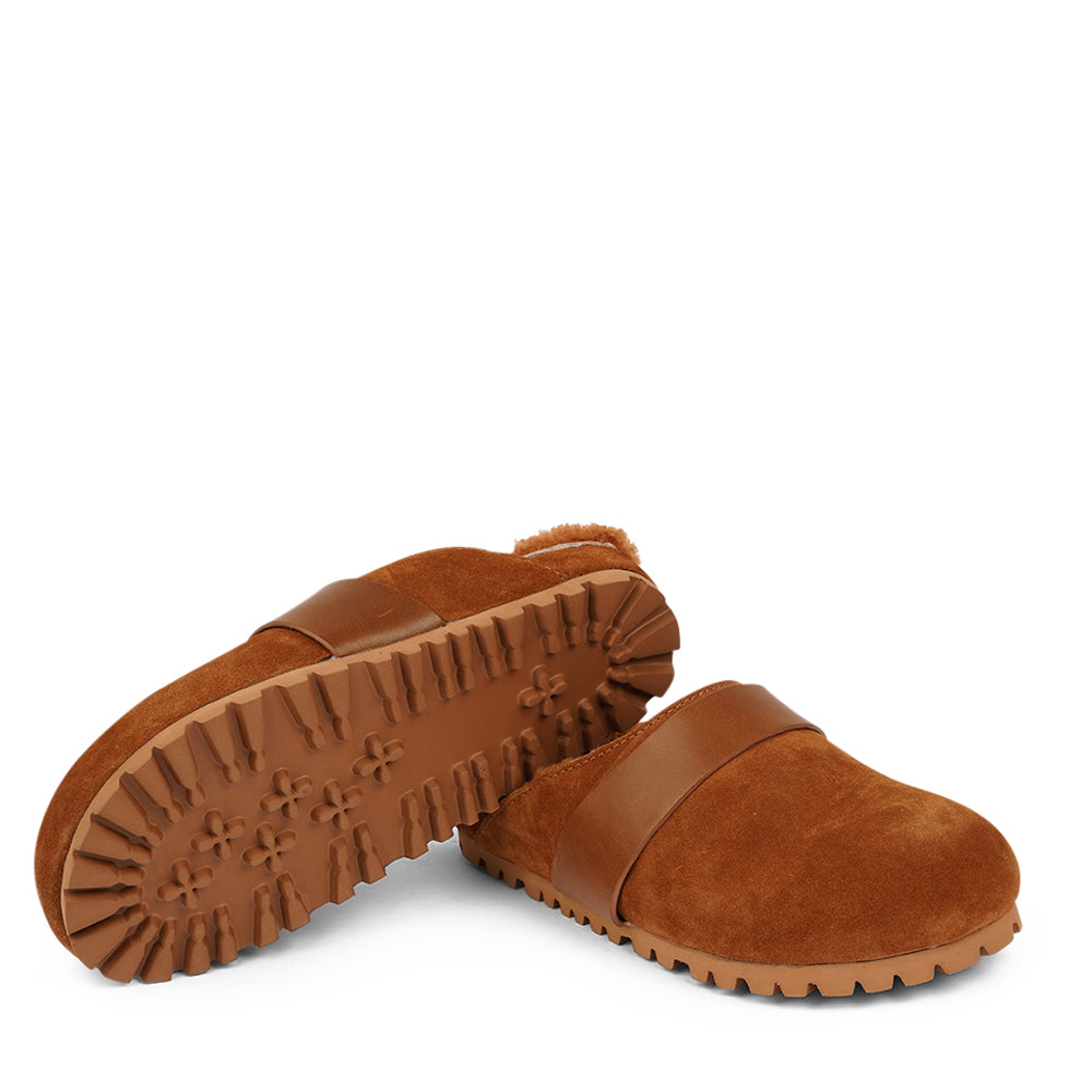 Lovelies Studio - Denmark - Suede mules with curly shearling lining

Lovelies shearling mules will bring softness and warmth to your feet this autumn. The ombination of soft curly shearling and the durable cork and rubber sole guarantees the utmost comfort to the wearer.