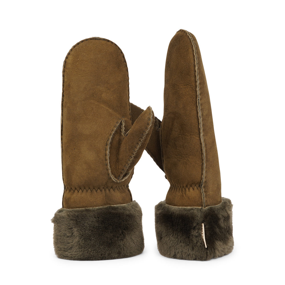 Lovelies - The Cima Long Shearling Mittens are crafted from 100% Australian double-faced shearling for ultimate warmth. The soft sheepskin palm and upper are complemented by a luxurious cuff and lining made of straight sheep fur.

Designed with an elastic wrist closure, these mittens offer a snug, comfortable fit. You can fold down the shearling cuff and tuck it under your coat sleeves for extra warmth, or wear the mittens over your winter sweater sleeves for added style and coziness.