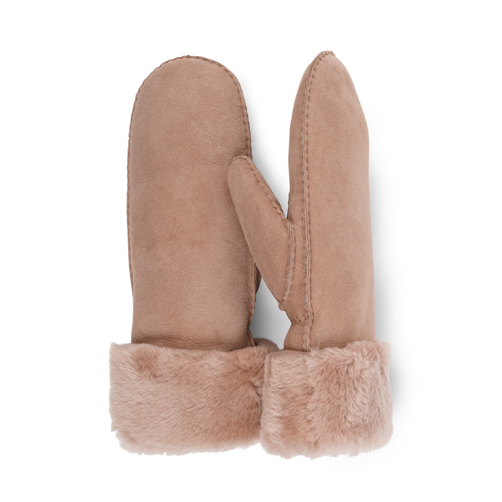 The Cima Long Shearling Mittens are crafted from 100% Australian double-faced shearling for ultimate warmth. The soft sheepskin palm and upper are complemented by a luxurious cuff and lining made of straight sheep fur.

Designed with an elastic wrist closure, these mittens offer a snug, comfortable fit. You can fold down the shearling cuff and tuck it under your coat sleeves for extra warmth, or wear the mittens over your winter sweater sleeves for added style and coziness.