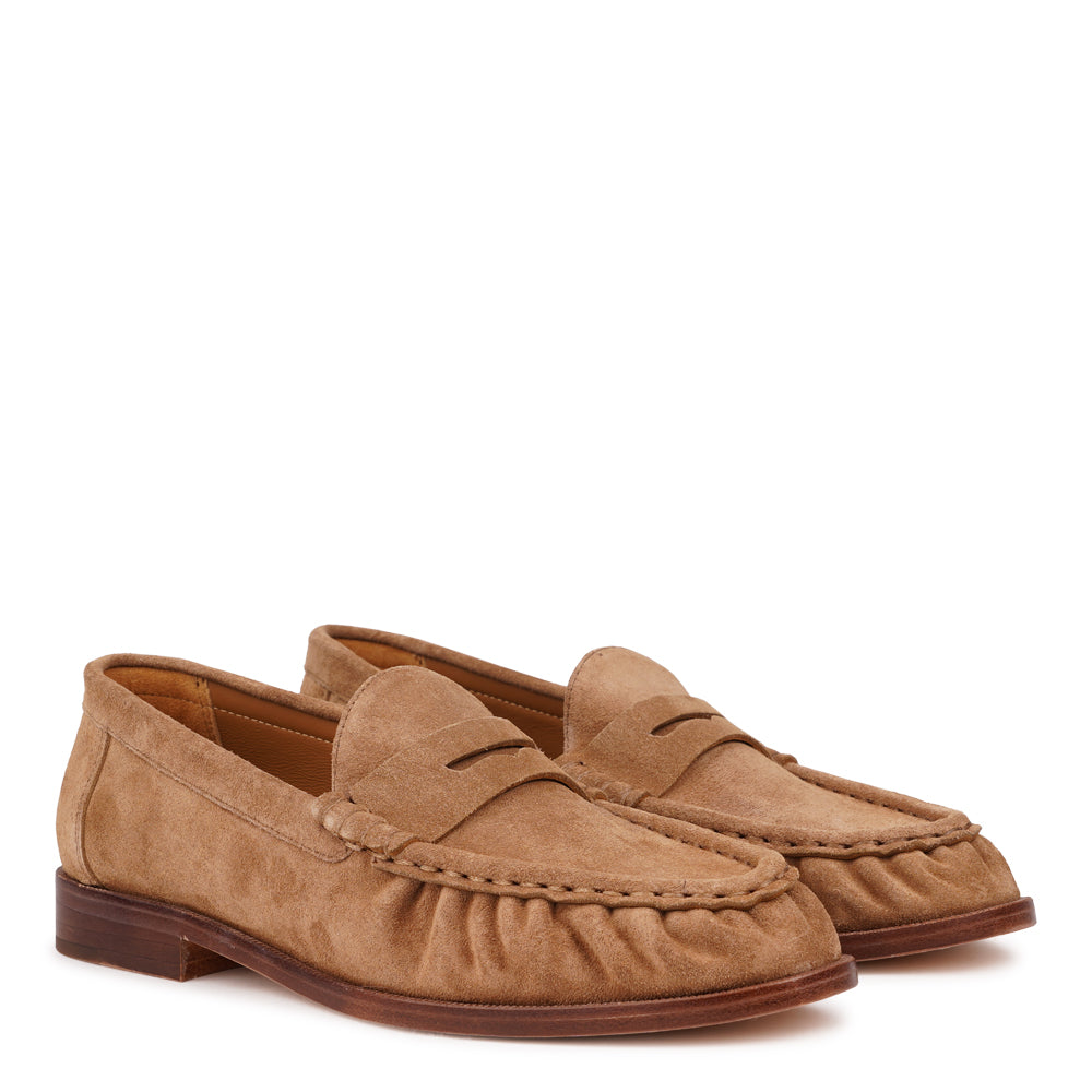 Corleone is a handcrafted Italian suede loafer that combines timeless elegance with contemporary cool.

Each pair is meticulously made using premium cow suede, delivering a soft, luxurious feel underfoot. The loafer features a full leather construction—from the supple suede upper to the leather lining, footbed, and durable leather outsole. Every detail reflects quality craftsmanship designed to age beautifully.

LWG Environmental GOLD RATED certified, ensuring responsible leather sourcing and production. A 