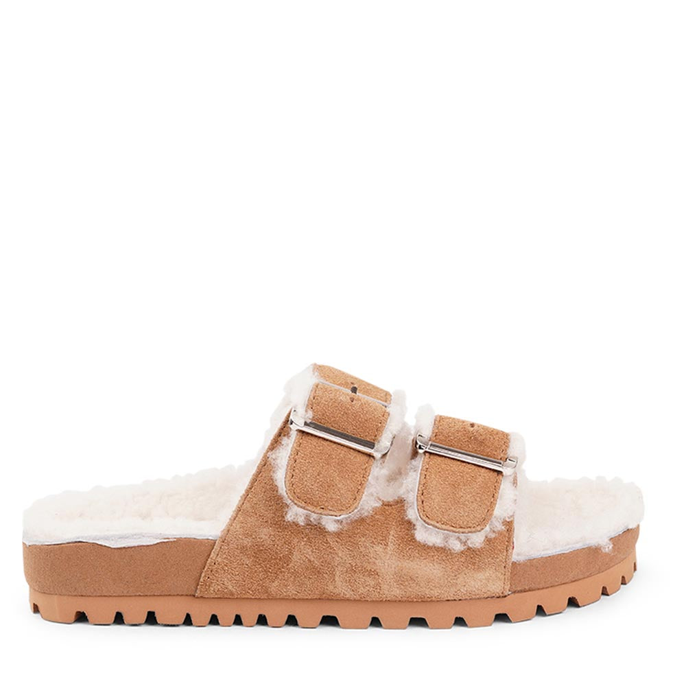 Lovelies Studio - Adjustable suede sandals with shearling lining  Lovelies shearling sandals will bring softness and warmth to your feet this autumn. The combination of soft shearling and the durable cork and rubber sole guarantees the utmost comfort to the wearer.