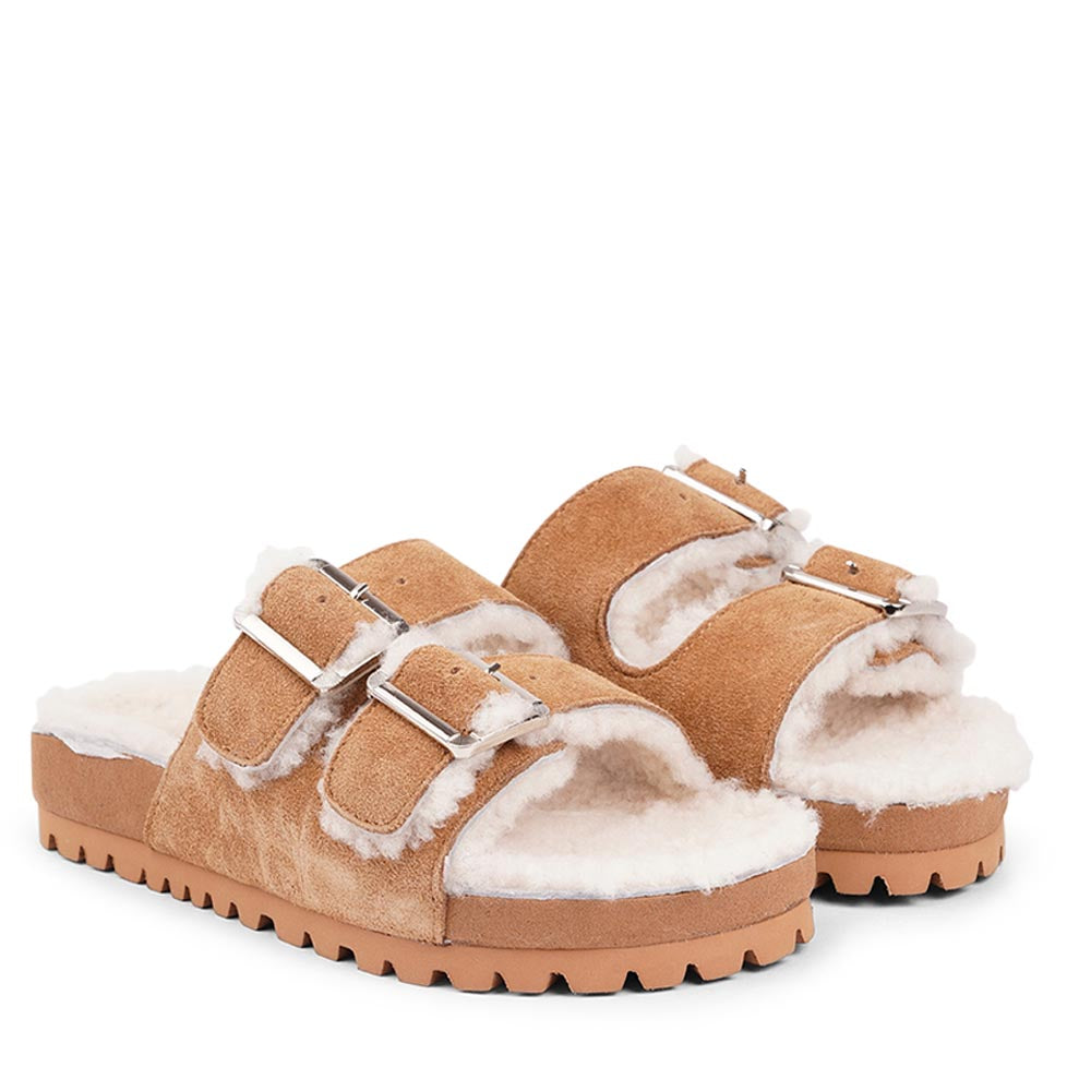 Lovelies Studio - Adjustable suede sandals with shearling lining  Lovelies shearling sandals will bring softness and warmth to your feet this autumn. The combination of soft shearling and the durable cork and rubber sole guarantees the utmost comfort to the wearer.