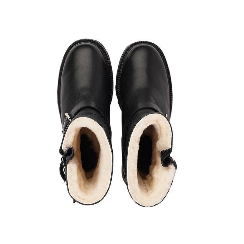 Lovelies Studio - Danish Design - Step into warmth and style this winter with our exquisite Dinara Winter Boot. Crafted to keep you snug and stylish through the coldest months.  The Dinara Winter Boot boasts a robust, thick rubber sole, providing superior traction and durability, so you can confidently navigate snowy streets and icy pathways. The upper is handcrafted in supple nappa leather.   Two adjustable buckles grace the boot's upper, allowing you to personalize the fit to your preference