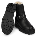 Lovelies Studio - Danish Design - Step into warmth and style this winter with our exquisite Dinara Winter Boot. Crafted to keep you snug and stylish through the coldest months.  The Dinara Winter Boot boasts a robust, thick rubber sole, providing superior traction and durability, so you can confidently navigate snowy streets and icy pathways. The upper is handcrafted in supple nappa leather.   Two adjustable buckles grace the boot's upper, allowing you to personalize the fit to your preference