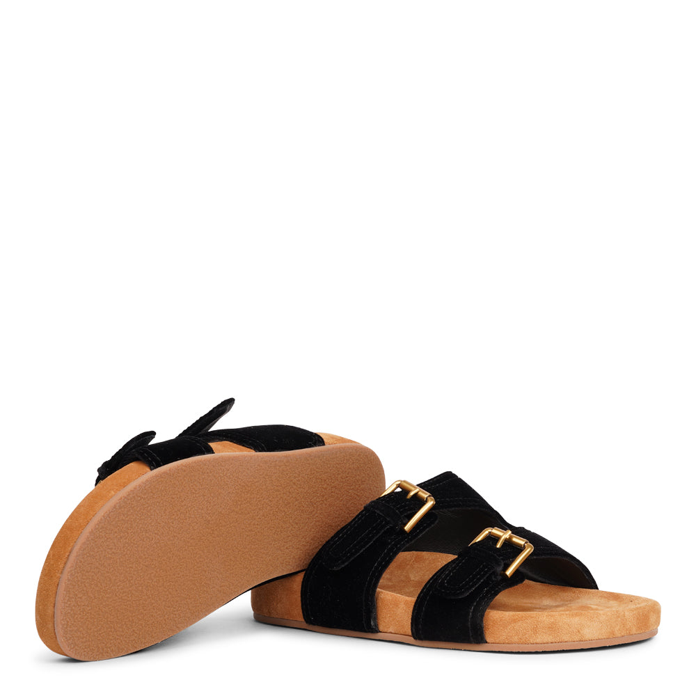 Lovelies Studio - Donori - Velvet double-strap sandals — a perfect blend of laid-back ease and refined luxury. Crafted from plush velvet with a smooth skin lining, they feature two wide straps with adjustable gold-tone buckles for a personalized fit. The contoured footbed, wrapped in premium suede, offers gentle support, while the lightweight sole ensures effortless wear from indoors to out. Ideal for relaxed days, sunny escapes, or stylish lounging at home.Adjustable gold-tone buckles