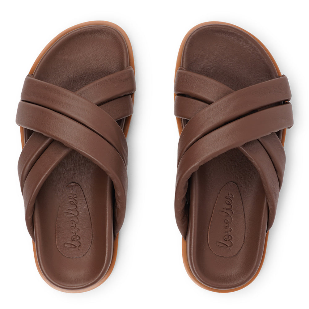 Lovelies Studio - These exquisite sandals feature four puffy leather straps that provide the perfect fit, ensuring that your feet feel supported and secure with every step. The soft midsole, also covered in supple nappa leather, offers an extra layer of cushioning for unparalleled comfort throughout the day.