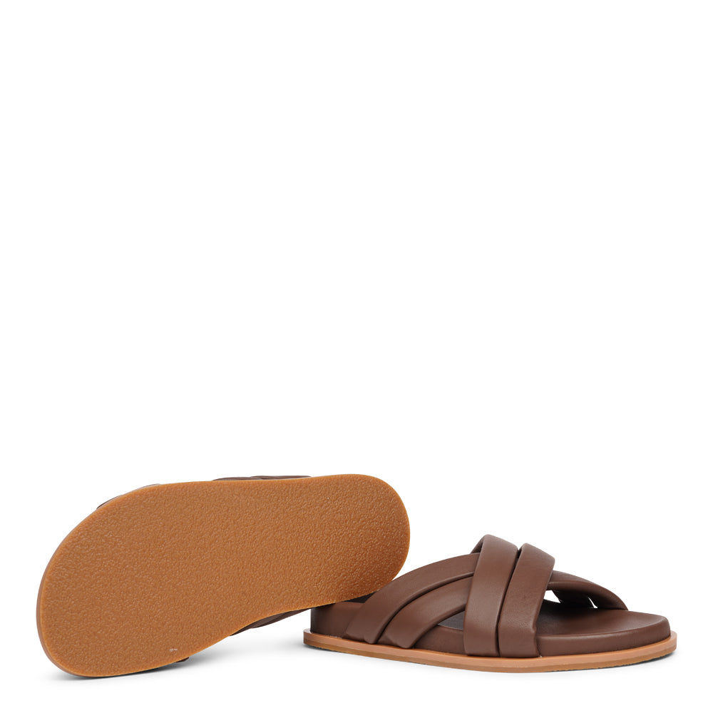 Lovelies Studio - These exquisite sandals feature four puffy leather straps that provide the perfect fit, ensuring that your feet feel supported and secure with every step. The soft midsole, also covered in supple nappa leather, offers an extra layer of cushioning for unparalleled comfort throughout the day.