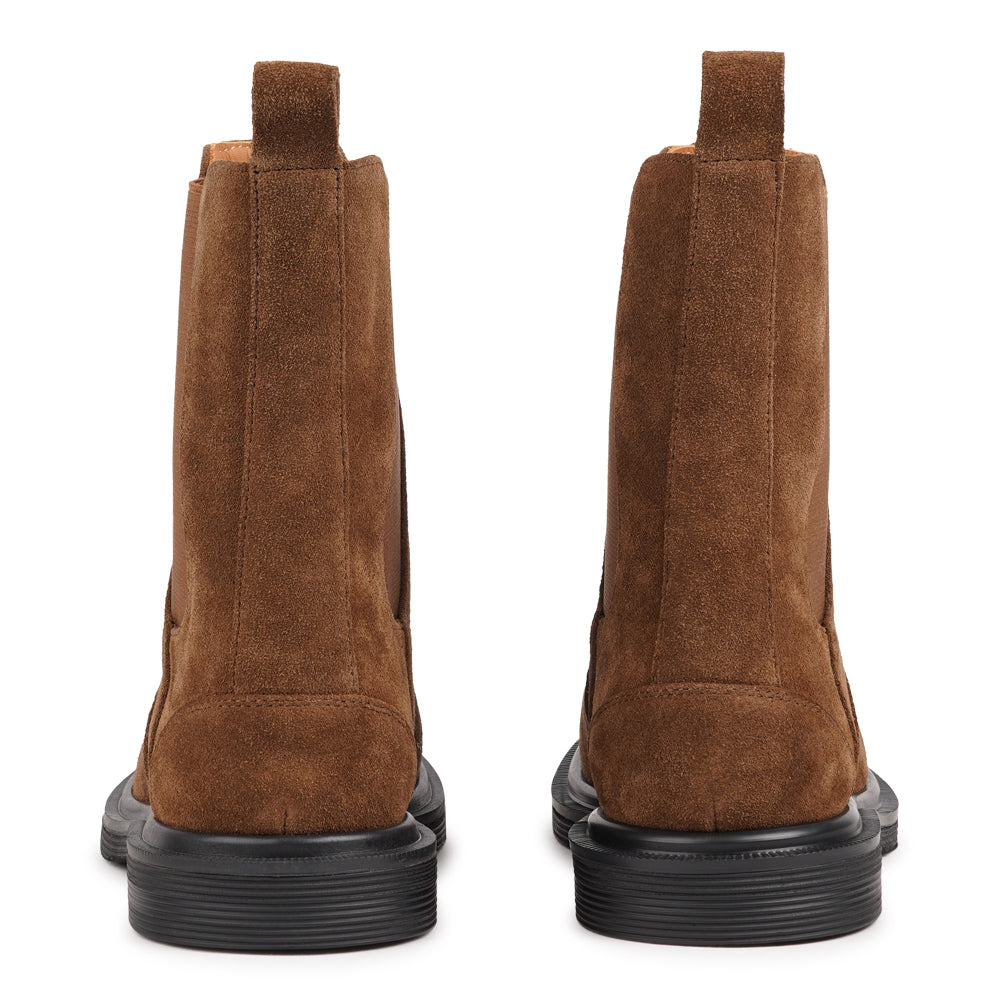 Felline boasts a sleek upper design with elasticized side gussets for both a snug fit and effortless style. Its pull tab on the back ensures easy wearability, perfect for those on-the-go moments.

With durable rubber soles, these boots offer excellent traction and stability, making them suitable for any terrain or weather conditions. Inside, a luxurious full leather lining, sourced from cowhide, provides unparalleled comfort and breathability, ensuring your feet feel pampered all day long.
