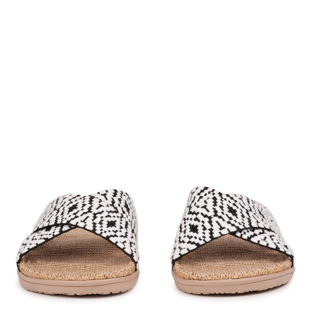 Lovelies Studio - The Gili sandal, a tribute to the serene Indonesian island that inspired its name.&nbsp;A sandal imbued with the essence of natural elegance, perfect for the summer season.

Slip into the Gili sandal and treat your feet to double-layered rubber soles that cushion every step with comfort. Its mid-sole featuring natural jute adds a dash of earthy elegance.