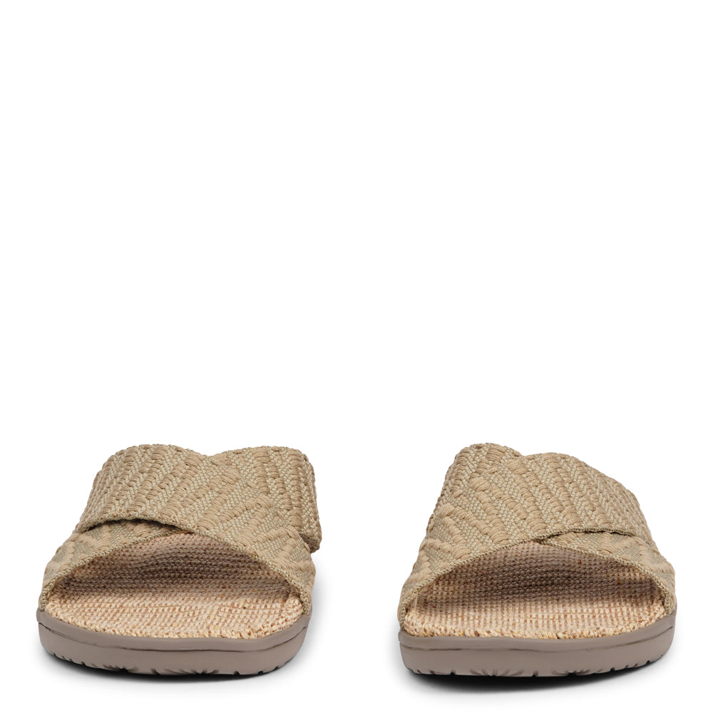 The casual Harmal sandal, a tribute to the breathtaking beach in North Goa that inspires its name.  Step into comfort and style with its unique design, featuring double-layered soft and durable rubber soles. The mid-sole, adorned with natural jute, adds a touch of eco-friendly elegance. Embrace both fashion and comfort as you stroll, thanks to the wide cotton straps intricately woven with captivating patterns, available in a spectrum of colors.