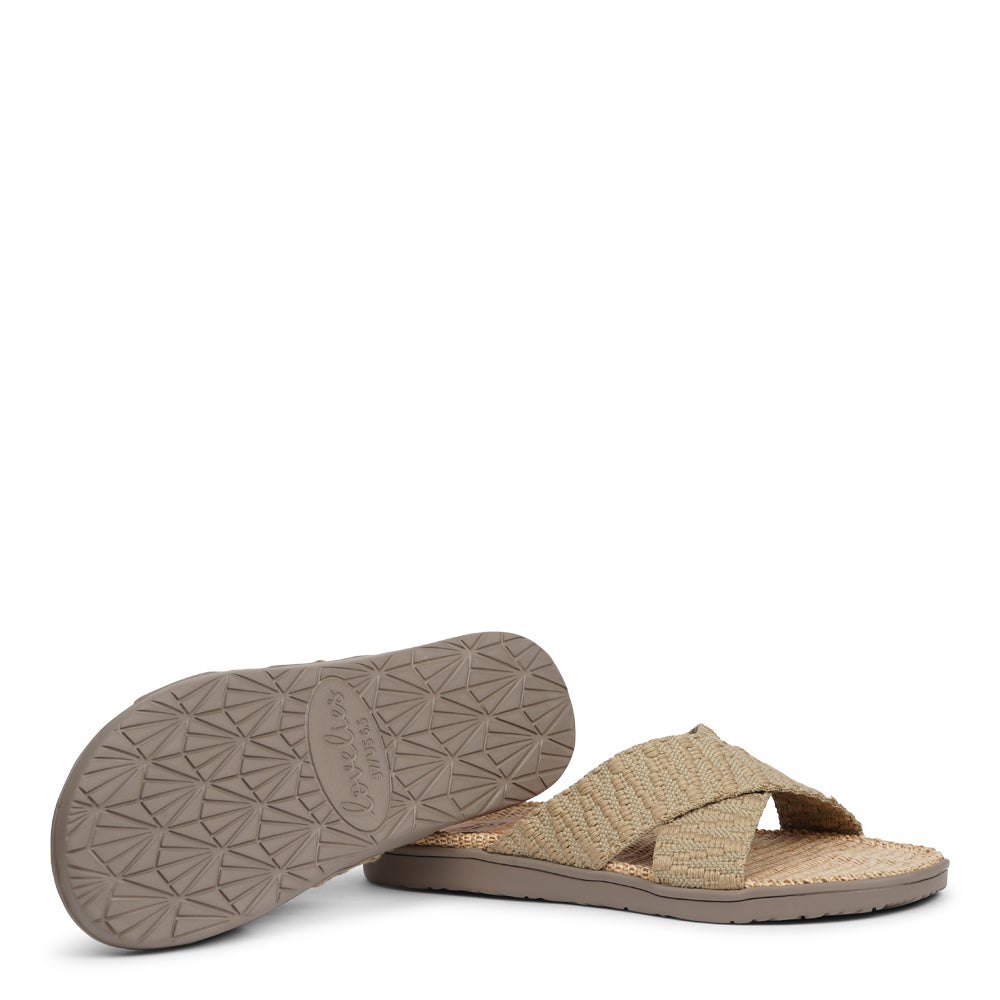 The casual Harmal sandal, a tribute to the breathtaking beach in North Goa that inspires its name.  Step into comfort and style with its unique design, featuring double-layered soft and durable rubber soles. The mid-sole, adorned with natural jute, adds a touch of eco-friendly elegance. Embrace both fashion and comfort as you stroll, thanks to the wide cotton straps intricately woven with captivating patterns, available in a spectrum of colors.