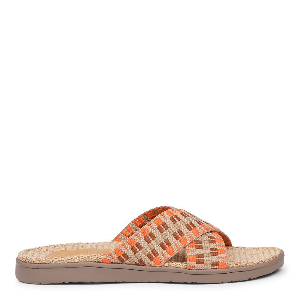 The casual Harmal sandal, a tribute to the breathtaking beach in North Goa that inspires its name.  Step into comfort and style with its unique design, featuring double-layered soft and durable rubber soles. The mid-sole, adorned with natural jute, adds a touch of eco-friendly elegance. Embrace both fashion and comfort as you stroll, thanks to the wide cotton straps intricately woven with captivating patterns, available in a spectrum of colors.