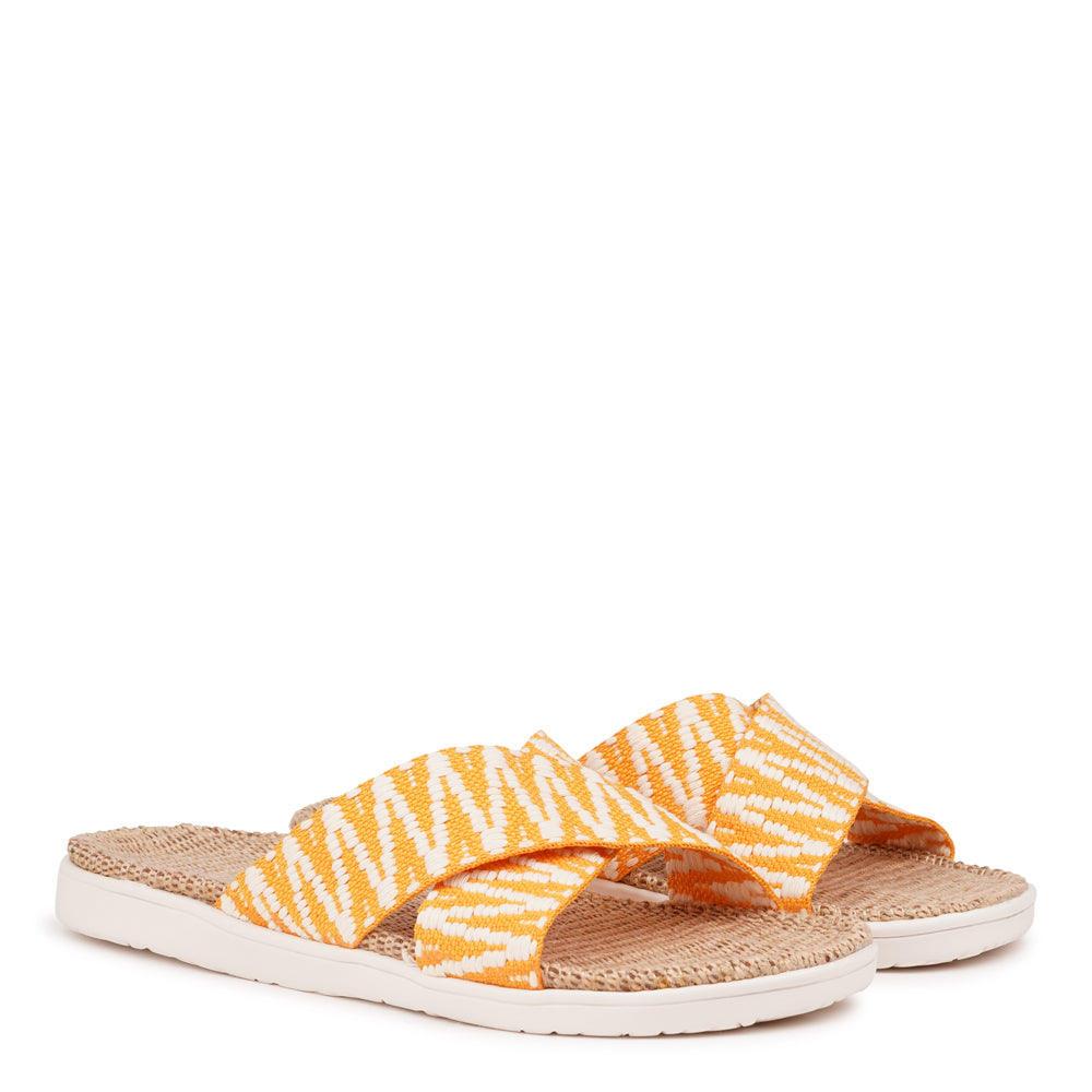 Lovelies Studio - The casual Harmal sandal, a tribute to the breathtaking beach in North Goa that inspires its name.

Step into comfort and style with its unique design, featuring double-layered soft and durable rubber soles. The mid-sole, adorned with natural jute, adds a touch of eco-friendly elegance. Embrace both fashion and comfort as you stroll, thanks to the wide cotton straps intricately woven with captivating patterns, available in a spectrum of colors.