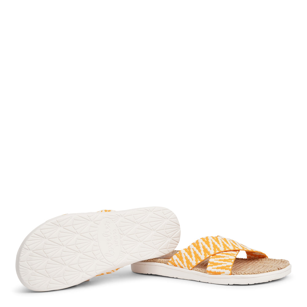 The casual Harmal sandal, a tribute to the breathtaking beach in North Goa that inspires its name.  Step into comfort and style with its unique design, featuring double-layered soft and durable rubber soles. The mid-sole, adorned with natural jute, adds a touch of eco-friendly elegance.