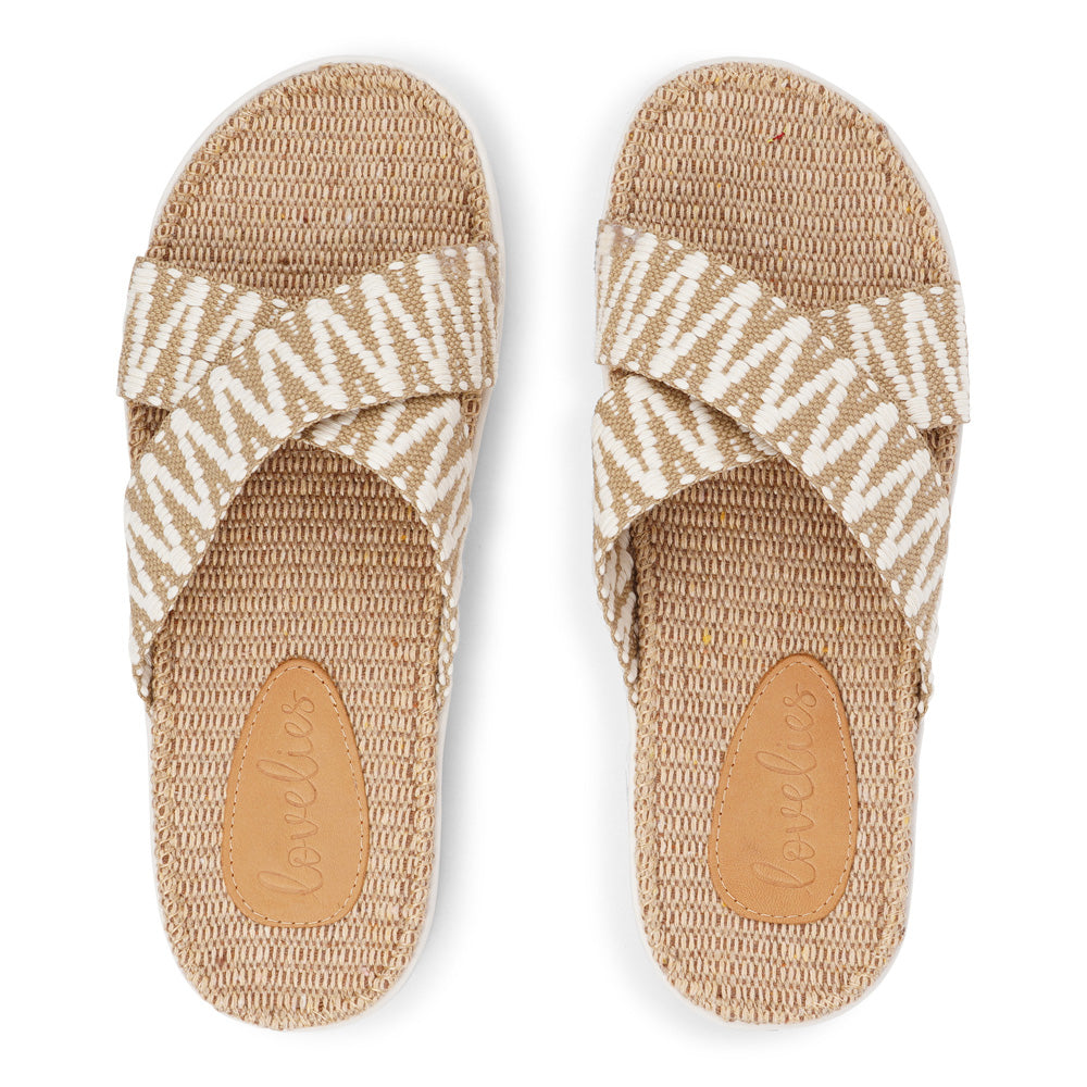 Lovelies Studio - The casual Harmal sandal, a tribute to the breathtaking beach in North Goa that inspires its name.  Step into comfort and style with its unique design, featuring double-layered soft and durable rubber soles. The mid-sole, adorned with natural jute, adds a touch of eco-friendly elegance.