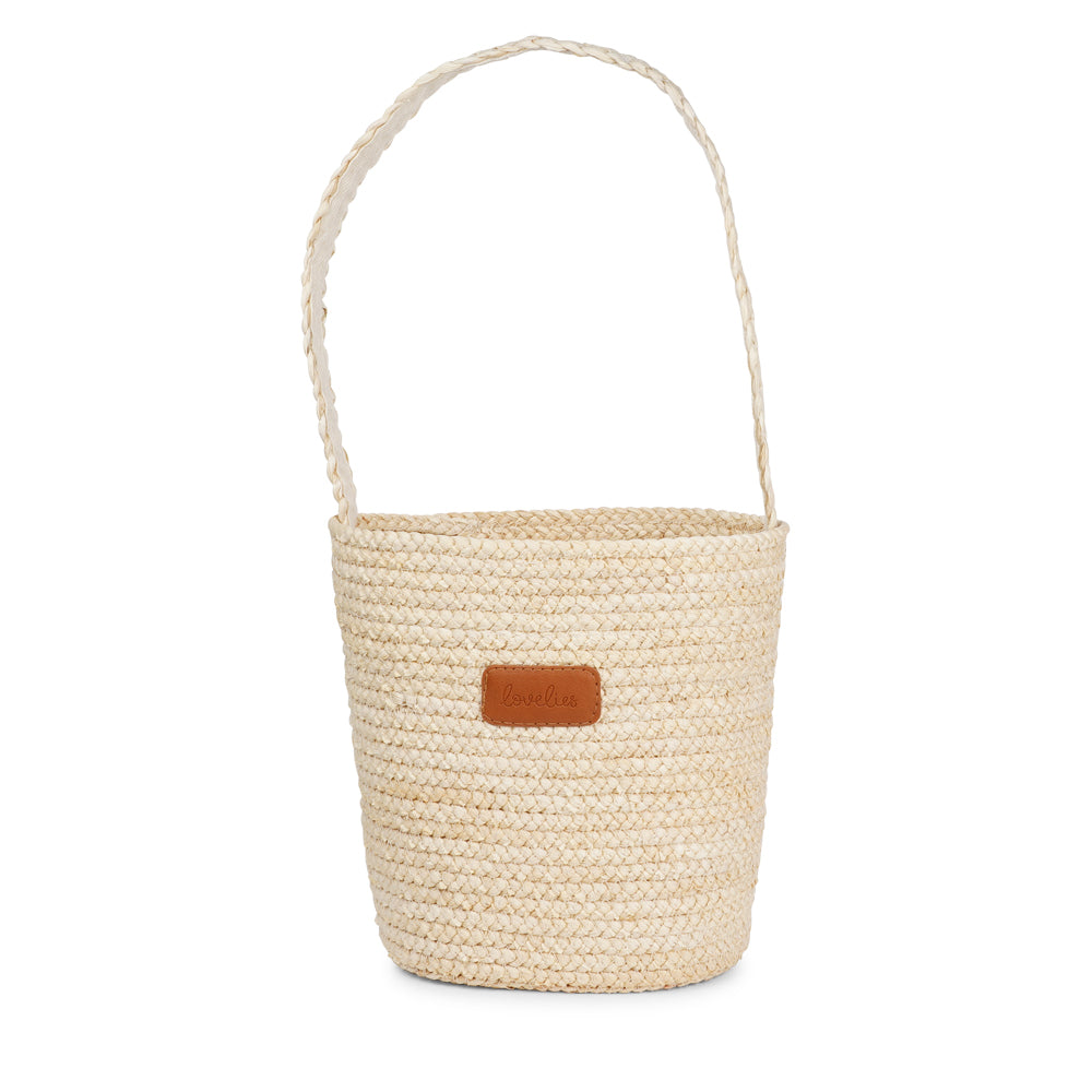 Handmade with care, the little Jerzu Maize Bag is your perfect companion for a trip to the market or a sunny day at the beach. Made of beautifully braided maize, it features a soft cotton lining and a small inner pocket—perfect for keeping your phone or essentials close at hand.&nbsp;

Light and breezy with natural charm – the perfect blend of laid-back style and everyday function.
