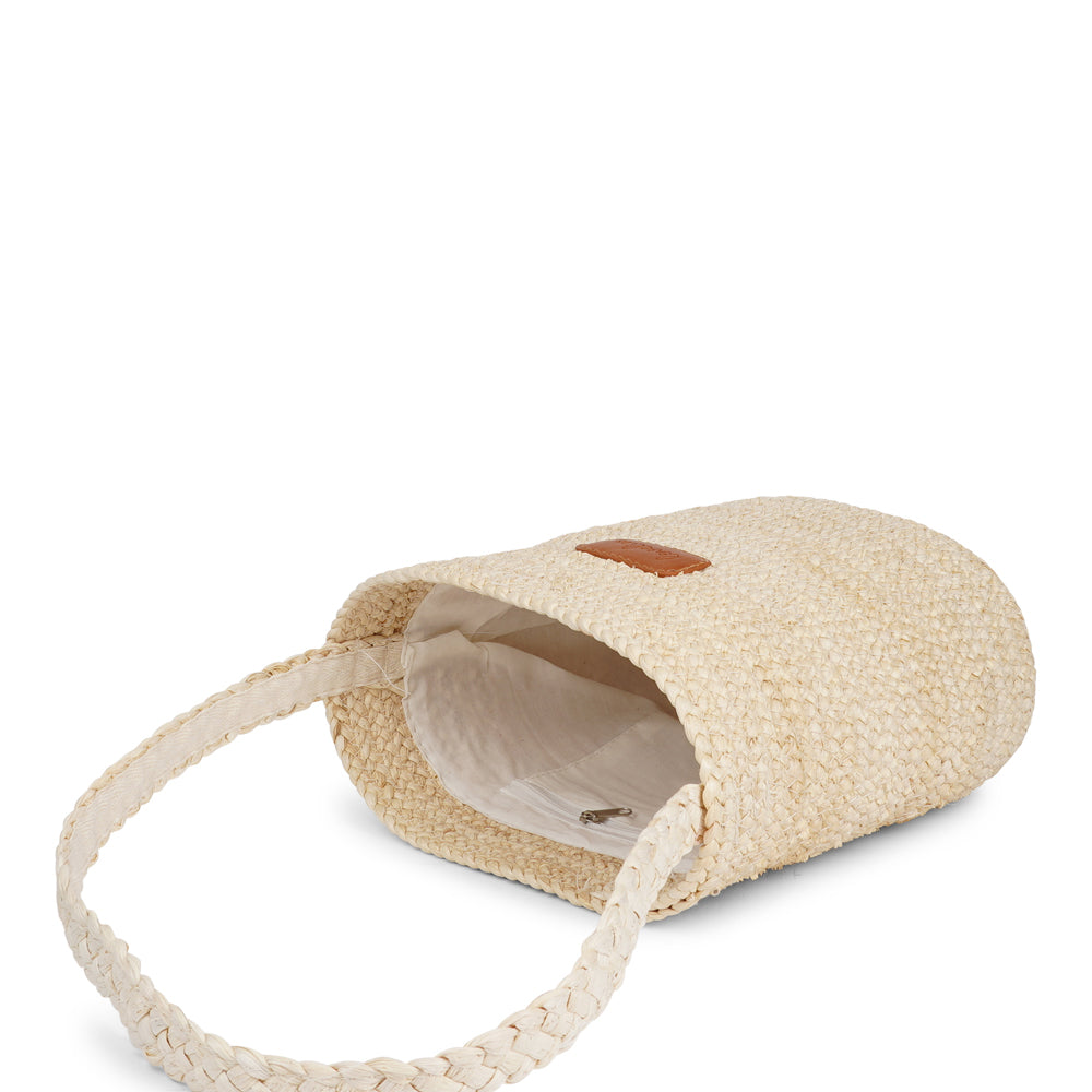 Handmade with care, the little Jerzu Maize Bag is your perfect companion for a trip to the market or a sunny day at the beach. Made of beautifully braided maize, it features a soft cotton lining and a small inner pocket—perfect for keeping your phone or essentials close at hand.&nbsp;

Light and breezy with natural charm – the perfect blend of laid-back style and everyday function.