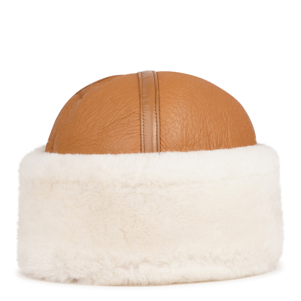 Stay warm and stylish this winter with the Kakani Shearling Hat, a perfect addition to your wardrobe.

Crafted from 100% sheepskin, this hat combines elegance and practicality. The lightweight material provides excellent insulation for cold days and naturally regulates temperature, making it versatile enough to wear into the spring.