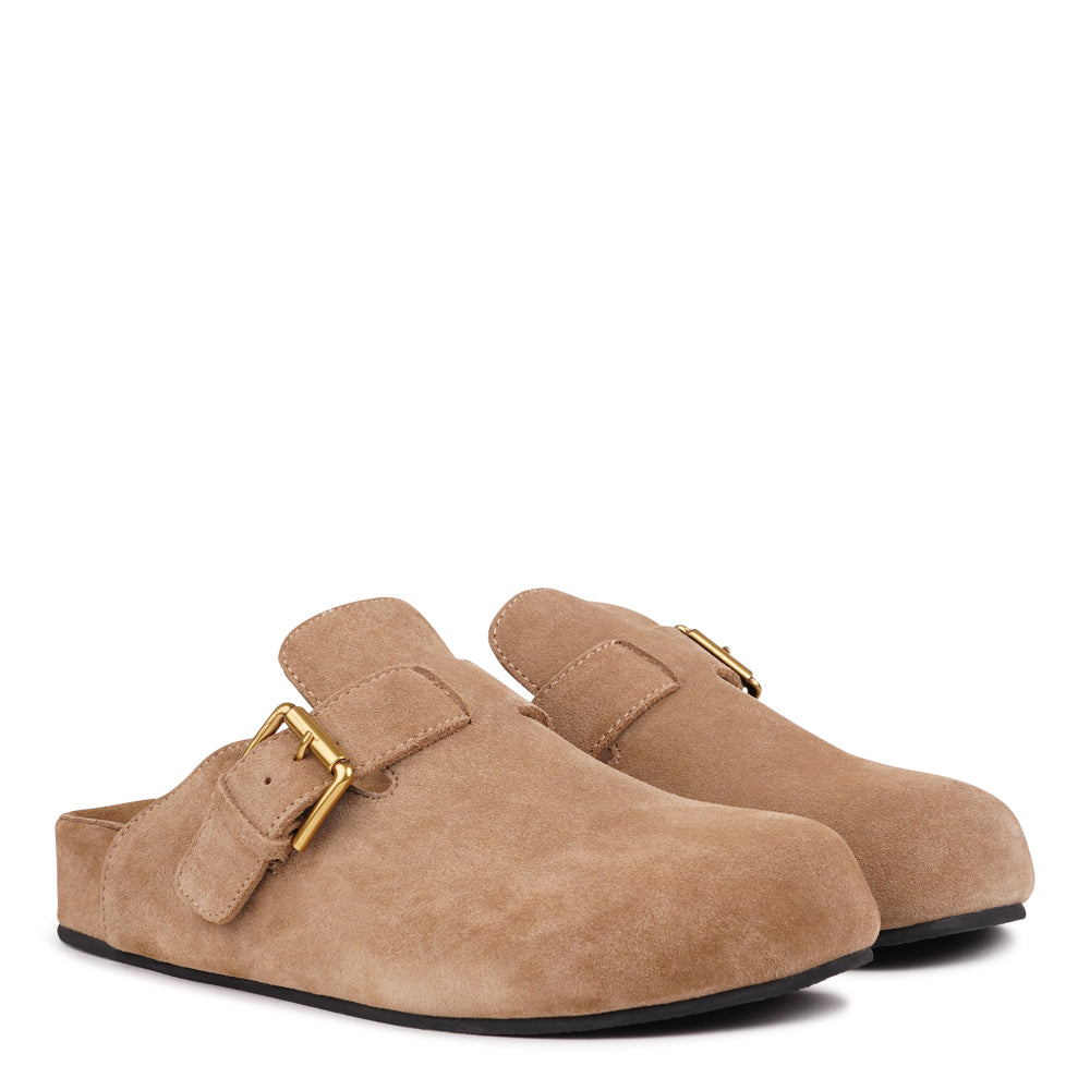 Step into effortless style and all-day comfort with our Kamakura Mules – designed for those who value quality, durability, and a flawless fit. These refined slip-ons combine premium materials with thoughtful construction, making them your go-to choice for both everyday wear and relaxed sophistication.

Built on a durable rubber outsole for long-lasting wear and reliable grip, the Kamakura Mules feature a soft, suede-covered PU midsole that cushions your step and naturally adapts to your foot’s shape over ti