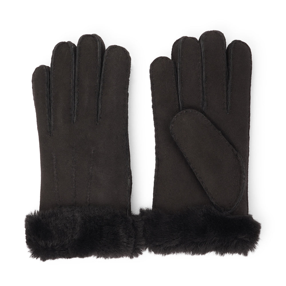 Where Elegance Meets Warmth  Elevate your winter wardrobe with our luxurious Kelly Shearling Gloves. Crafted from supple sheep leather, these gloves are designed to provide you with both style and warmth during the colder months.  These gloves are uniquely long and slim, providing a sleek and feminine silhouette that not only keeps you warm but also adds a chic touch to any outfit.