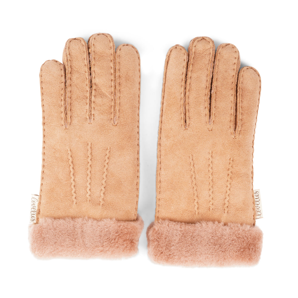 Elevate your winter wardrobe with our luxurious Kelly Shearling Gloves. Crafted from supple sheep leather, these gloves are designed to provide you with both style and warmth during the colder months.  These gloves are uniquely long and slim, providing a sleek and feminine silhouette that not only keeps you warm but also adds a chic touch to any outfit.