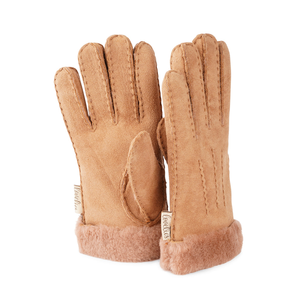 Elevate your winter wardrobe with our luxurious Kelly Shearling Gloves. Crafted from supple sheep leather, these gloves are designed to provide you with both style and warmth during the colder months.  These gloves are uniquely long and slim, providing a sleek and feminine silhouette that not only keeps you warm but also adds a chic touch to any outfit.